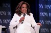 FILE - Oprah Winfrey discusses the book 