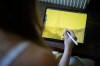 Illustrator Marina Antonova works on a drawing for her series called 