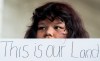 A protester is seen a protest led by the Okiniwak Youth Led Movement on the property of the Canadian Museum of History during the First Nations Summit n Gatineau, Que., on Thursday, July 17, 2025. THE CANADIAN PRESS/Spencer Colby