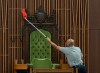 A House of Commons maintenance and material handling employee wipes down the Speakers chair in the House of Commons during a photo op in Ottawa, Thursday, Sept. 17, 2026. THE CANADIAN PRESS/Adrian Wyld