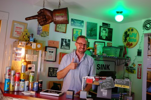 John Wilson poses for a photograph at the Low Cinema on Tuesday, Sept. 8, 2026, in the Ridgewood section of Queens borough of New York. (AP Photo/Jake Coyle)