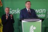 Prime Minister Mark Carney, left, applauds as Saskatchewan Premier Scott Moe speaks at Canada's national investment summit, in Toronto, on Monday, Sept. 14, 2026. THE CANADIAN PRESS/Nathan Denette
