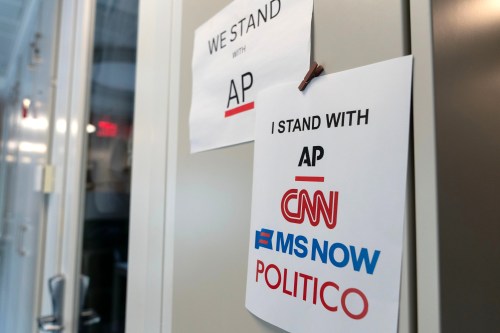 A sign in support of news outlets is seen at the White House press room, Sept. 19, 2026, in Washington. (AP Photo/Jose Luis Magana)
