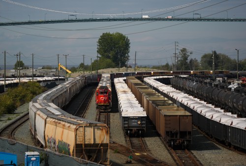 Rail cars and a locomotive are seen at CN Rail's McLean Yard near the Lions Gate Bridge, in North Vancouver, B.C., on Tuesday, Sept. 1, 2026. THE CANADIAN PRESS/Darryl Dyck