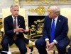 Prime Minister Mark Carney and U.S. President Donald Trump hold a press conference at the White House in Washington, D.C., Tuesday, Oct. 7, 2025. THE CANADIAN PRESS/Adrian Wyld