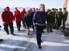 Prime Minister Mark Carney leaves a photo opportunity after making an announcement at a Canadian Armed Forces forward-operating location in Iqaluit, Nunavut, on Tuesday, March 18, 2025. THE CANADIAN PRESS/Sean Kilpatrick