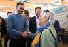 Parti Québécois Leader Paul St-Pierre Plamondon meets a convinced sovereigntist, Helene Morin while visiting a local market in Quebec City, Saturday, Sept. 26, 2026. Quebecers are going to the polls for a provincial election on Oct. 5. THE CANADIAN PRESS/Jacques Boissinot