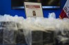 An FBI Wanted poster for Satinderjeet Singh is displayed at a news conference at the Federal Building in Los Angeles, Tuesday, July 7, 2026.(AP Photo/Jae C. Hong)