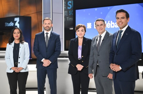 From left, Quebec Solidaire co-spokesperson Ruba Ghazal, Parti Québécois Leader Paul St-Pierre Plamondon, Coalition Avenir Québec Leader Christine Fréchette, Quebec Conservative Leader Éric Duhaime and Quebec Liberal Leader Charles Milliard pose prior to the start of a leaders debate in Montreal on Wednesday, Sept. 23, 2026. Quebec votes in a provincial election on Oct. 5, 2026. THE CANADIAN PRESS/Graham Hughes