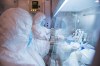 This undated photo released in 2019 by the Irkutsk Anti-Plague Research Institute of Siberia and Far East, shows the institute workers in a lab. (The Irkutsk Anti-Plague Research Institute of Siberia and Far East via AP) Photo was released in 2019