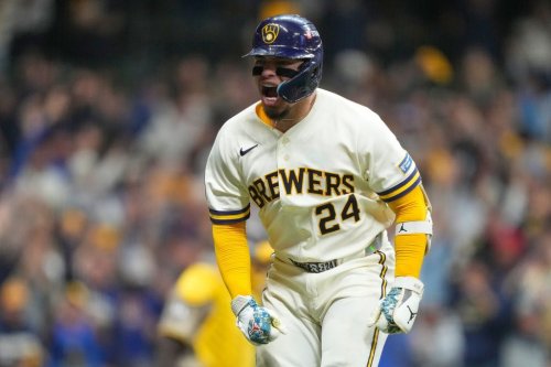 Milwaukee Brewers' William Contreras reacts after hitting a home run during the seventh inning in Game 1 of a National League Divisional baseball playoff series against the San Diego Padres Saturday, Oct. 3, 2026, in Milwaukee. (AP Photo/Kayla Wolf)