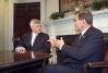 Homeland Security Director Tom Ridge, right, meets with Canada's Foreign Minister John Manley at the White House in Washington, Wednesday, Oct. 24, 2001. (AP Photo/Ron Edmonds)