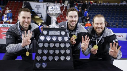 Team Wild Card One skip Brad Gushue, left, second Brett Gallant, centre, and lead Geoff Walker celebrate their victory over Team Alberta at the Tim Hortons Brier in Lethbridge, Alta., on March 13, 2022. THE CANADIAN PRESS/Jeff McIntosh