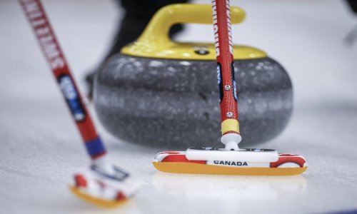Curling brooms are shown at the Scotties Tournament of Hearts in Calgary on Feb. 22, 2024. THE CANADIAN PRESS/Jeff McIntosh