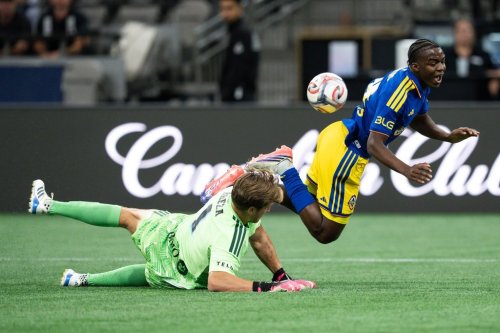 CF Montreal goalkeeper Sebastian Breza (1) stops Vancouver Whitecaps' Bruno Caicedo (14) during second-half Canadian Championship semifinal soccer action in Vancouver on Wednesday, Sept. 2, 2026. THE CANADIAN PRESS/Ethan Cairns