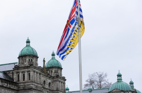The B.C. provincial flag hangs in front of the Legislature building in Victoria, on Tuesday, April 14, 2026. THE CANADIAN PRESS/Chad Hipolito