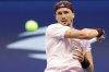 Alexander Zverev, of Germany, returns the ball to Ben Shelton, of the United States, during the men's singles final of the U.S. Open tennis championships Sunday, Sept. 13, 2026, in New York. (AP Photo/Adam Hunger)
