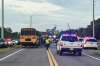 In this photo provided by the Polk County Sheriff's Office, emergency personnel respond to an accident involving a school bus in Winter Haven, Fla., on Monday, Oct. 5, 2026. (Polk County Sheriff's Office via AP)