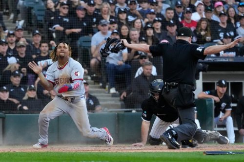 Cleveland Guardians' José Ramírez, left, celebrates after scoring on a fielder's choice by Chase DeLauter during the fifth inning in Game 3 of baseball's American League Division Series against the Chicago White Sox Wednesday, Oct. 7, 2026, in Chicago. (AP Photo/Nam Y. Huh)