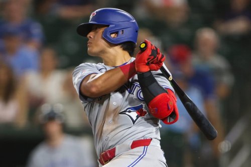 Toronto Blue Jays' Kazuma Okamoto hits a single during the sixth inning of a baseball game against the Athletics Tuesday, Sept. 8, 2026, in West Sacramento, Calif. (AP Photo/Scott Marshall)