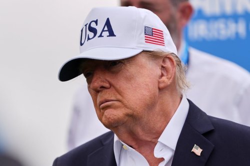 U.S. President Donald Trump attends the Irish Open golf tournament at Trump International Golf Links in Doonbeg, Ireland, Sunday, Sept. 13, 2026. (AP Photo/Julia Demaree Nikhinson)