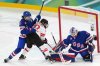 United States goalie Aerin Frankel (31) makes a save on Canada's Sarah Fillier (10) as United States' Megan Keller (5) defends during the third period of the women's gold medal hockey game at the 2026 Winter Olympics, in Milan, Thursday, Feb. 19, 2026. THE CANADIAN PRESS/Nathan Denette