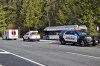 A man has been sentenced to 15 years after allegedly slashed a man's throat on a public bus in Surrey, British Columbia, in 2023. Police officers and paramedics attend the scene of a stabbing onboard a transit bus in Surrey, B.C. on Saturday April 1, 2023. THE CANADIAN PRESS/Shane MacKichan