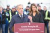 Prime Minister Mark Carney speaks as Alberta Premier Danielle Smith listens in Fort McMurray on Thursday Oct 1, 2026. Prime Minister Mark Carney declared the Pacific Link pipeline project to be in the national interest. THE CANADIAN PRESS/Greg Halinda