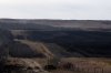 The burned area on CFB Wainwright is pictured south of the town of Wainwright, Alta, on Monday, Oct. 19, 2026. THE CANADIAN PRESS/Christopher Katsarov