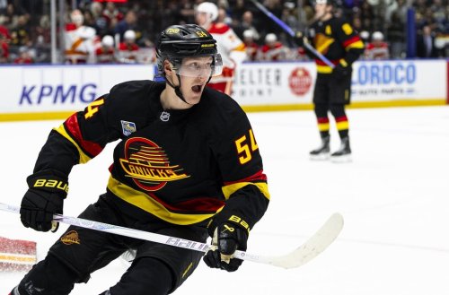 Vancouver Canucks' Aatu Raty (54) celebrates a goal during the third period of an NHL hockey game against the Calgary Flames in Vancouver on Saturday, Oct. 3, 2026. THE CANADIAN PRESS/Jacob Mallari