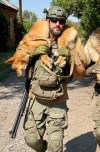 Jesse Adams seen rescuing a dog in Ukraine in this undated photo. — THE CANADIAN PRESS/Handout — Athletics Canada Jesse Adams Facebook (Mandatory Credit)