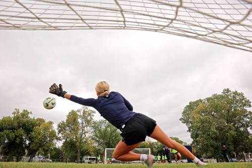 Goalkeeper dives to block a shot on net as the Brandon University Bobcats women&rsquo;s soccer team takes part in preseason training at the university. Brandon University&rsquo;s men&rsquo;s and women&rsquo;s soccer teams take on Assiniboine College at the Health Living Centre on Oct. 10. (Tim Smith/The Brandon Sun)