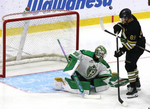 Prince Albert Raiders goalie Steele Bass (35) defends the net as Brandon Wheat Kings forward Kris Muissu (89) deflects a shot over the net during Western Hockey League action at Assiniboine Credit Union Place on Sunday. (Perry Bergson/The Brandon Sun) Oct. 18, 2026
