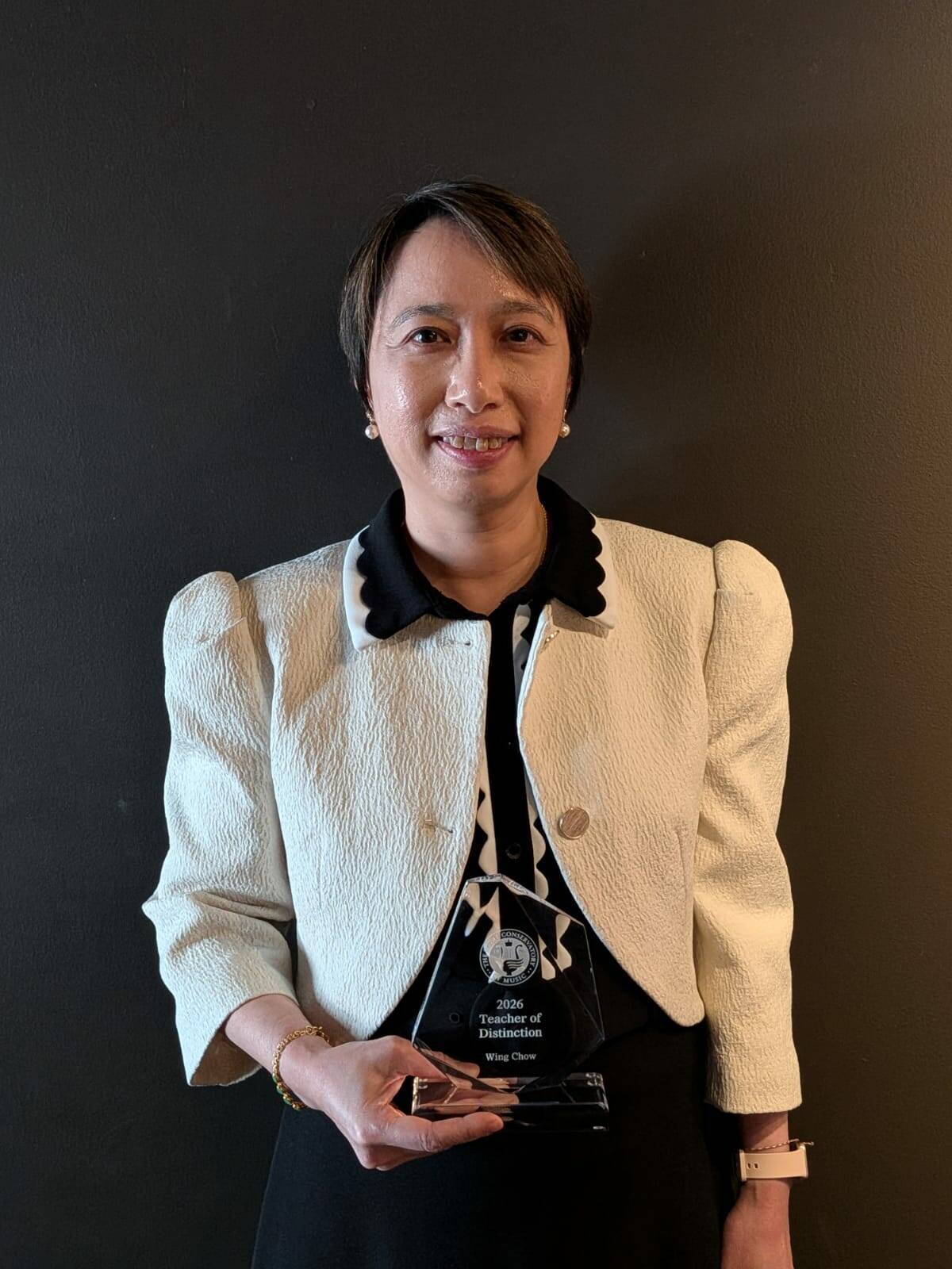 New Era music teacher wins national award