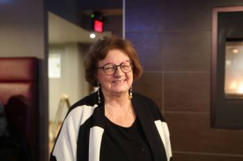 Trustee Linda Ross stands inside the Clarion Hotel bar on Wednesday evening. (Abiola Odutola/The Brandon Sun)