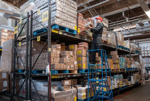 Victor stocks shelves at the North York Harvest Food Bank in Toronto on Tuesday Oct. 20, 2026. THE CANADIAN PRESS/Frank Gunn