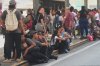 People gather outside shopping mall after an earthquake hit Panama City, Friday, Oct. 9, 2026. (AP Photo/Aris Mariota)
