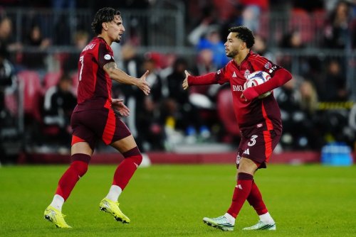 Toronto FC's Matheus Pereira (right) celebrates his goal against Orlando City SC with Theo Corbeanu (7) during second half MLS soccer action in Toronto on Wednesday, Oct. 14, 2026. THE CANADIAN PRESS/Frank Gunn