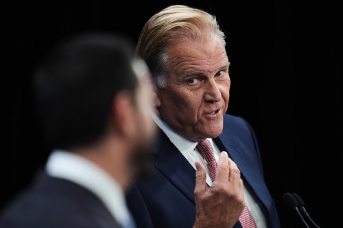 Republican nominee for U.S. Senate Mike Rogers, right, responds to Democratic nominee for U.S. Senate Abdul El-Sayed, during a televised debate at WOOD-TV, on Thursday, Oct. 8, 2026, in Grand Rapids, Mich. (AP Photo/Paul Sancya, Pool)