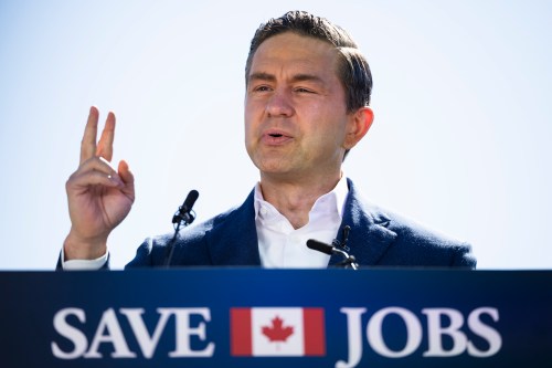 Conservative Leader Pierre Poilievre speaks about job losses during a press conference across the Hamilton Harbour from the Stelco steel production facility in Burlington, Ont., on Friday, Oct. 9, 2026. THE CANADIAN PRESS/Nick Iwanyshyn