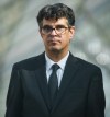 Author and former University of British Columbia professor Steven Galloway is seen through a window as he leaves B.C. Supreme Court during a lunch break at his defamation lawsuit, in Vancouver, on Tuesday, Oct. 6, 2026. THE CANADIAN PRESS/Darryl Dyck