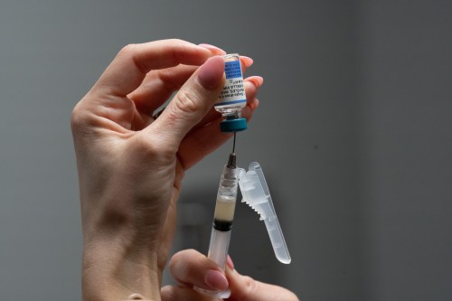 Health officials in Manitoba are declaring a province-wide measles outbreak that began in 2025 over. Lauren Ellenburg, a nurse, prepares a combination measles, mumps and rubella vaccine for a 12-month-old at Tiger Pediatrics in Easley, S.C., on March 17, 2026. (AP Photo/Mary Conlon)