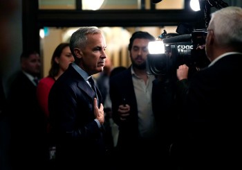 Prime Minister Mark Carney responds to questions from journalists as he arrives on Parliament Hill in Ottawa, before a meeting of the federal cabinet, on Tuesday, Oct. 6, 2026. THE CANADIAN PRESS/Justin Tang