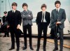 FILE - The Beatles, from left, John Lennon, George Harrison, Ringo Starr and Paul McCartney, arrive in Liverpool, England, on July 10, 1964, for the premiere of their movie 