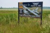 Signage for the Steinbach South Airport which is in proximity to the scene of a crash involving two aircraft near Steinbach, Man., Tuesday July 8, 2025. THE CANADIAN PRESS/David Lipnowski