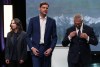 B.C. Green Party Leader Emily Lowan, from left to right, B.C. NDP Leader David Eby and interim B.C. Conservative leader Lorne Doerkson stand together after the televised B.C. Leaders' Debate ahead of the provincial election, in Vancouver, on Wednesday, Oct. 14, 2026. THE CANADIAN PRESS/Darryl Dyck