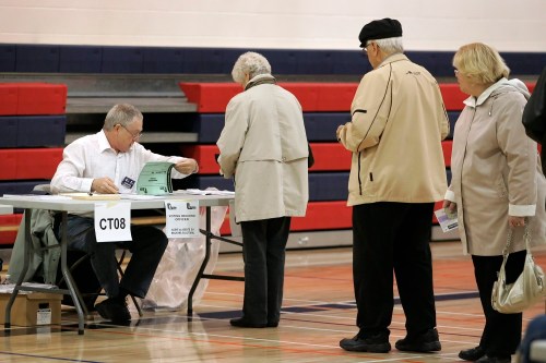People line up to vote in the municipal election in Winnipeg, Wednesday, Oct. 27, 2010.   THE CANADIAN PRESS/John Woods