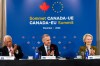 Prime Minister Mark Carney, centre, gives remarks alongside President of the European Council Antonio Costa, left, and President of the European Commission Ursula von der Leyen, at a roundtable with business leaders during the Canada-EU Summit, in Montreal, on Thursday, Oct. 29, 2026. THE CANADIAN PRESS/Christopher Katsarov