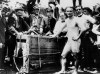 FILE - Escape artist Harry Houdini appears before being lowered in a packing crate into the ice-covered Detroit River in 1907. (AP Photo)