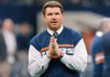 FILE - Chicago Bears head coach Mike Ditka strikes a prayerful pose as he watches the team workout, Jan. 26, 1986 in New Orleans before the start of NFL football's Super Bowl XX. (AP Photo/Rob Kozloff, File)